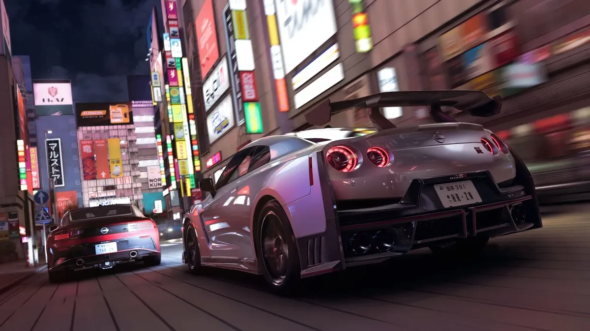 ネオンが並ぶ夜の繁華街を走るForza Horizon 6のスポーツカー2台